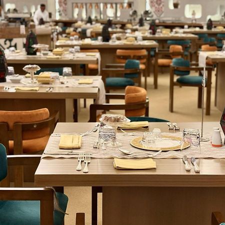 The Venue Jeddah Corniche Hotel Exterior photo The dining room at the Emirates Lounge at Dubai International Airport
